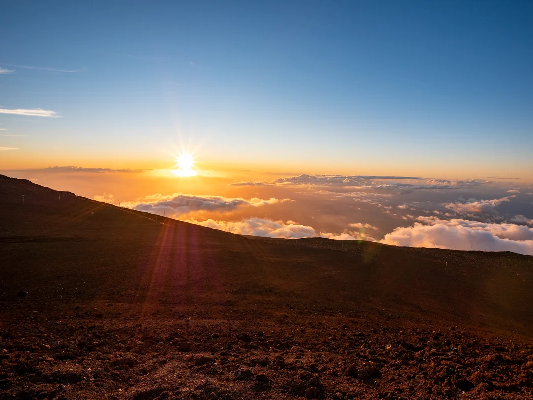 Sunset above the clouds